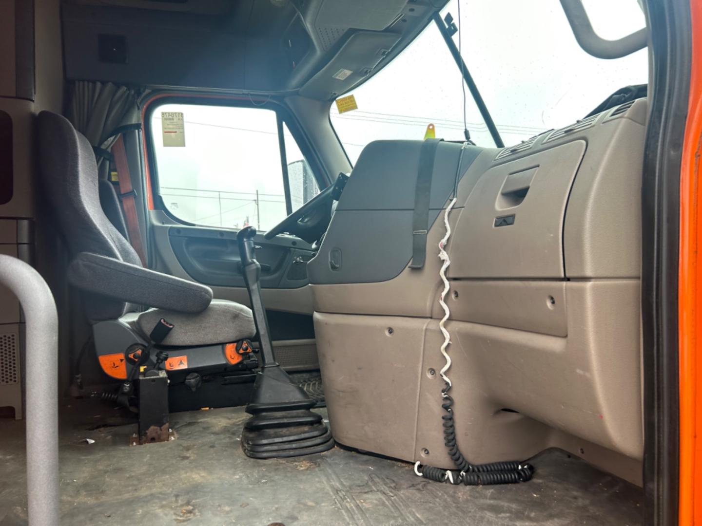 2013 Orange Freightliner Cascadia 125 (3AKJGLDR0DS) , located at 1687 Business 35 S, New Braunfels, TX, 78130, (830) 625-7159, 29.655487, -98.051491 - Photo#8